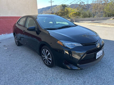2019 Toyota Corolla for sale at ARAX AUTO SALES in Tujunga CA