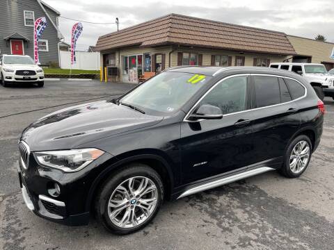 2017 BMW X1 for sale at MAGNUM MOTORS in Reedsville PA