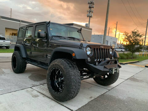 2017 Jeep Wrangler Unlimited for sale at AUTO BURGOS in Hollywood FL