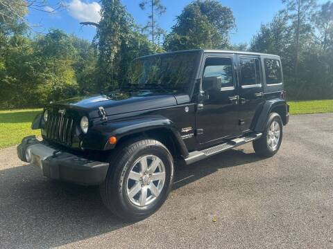 2014 Jeep Wrangler Unlimited for sale at VASS Automotive in Deland FL