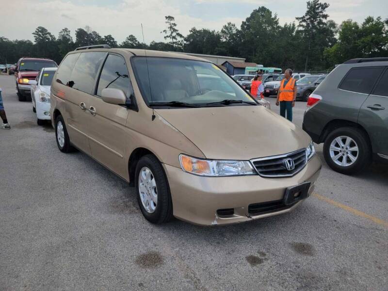 2002 Honda Odyssey for sale at TEXAS MOTOR CARS in Houston TX