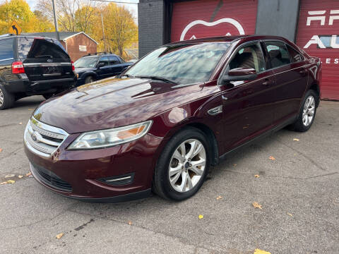 2011 Ford Taurus for sale at Apple Auto Sales Inc in Camillus NY