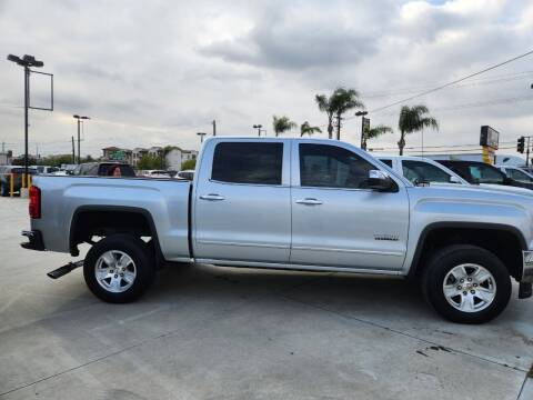 2015 GMC Sierra 1500 for sale at E and M Auto Sales in Bloomington CA