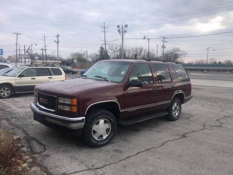 1999 GMC Yukon for sale at BELL AUTO & TRUCK SALES in Fort Wayne IN