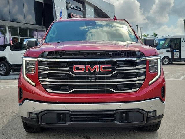 Used 2022 GMC Sierra 1500 SLT with VIN 3GTUHDED0NG583864 for sale in Miami, FL