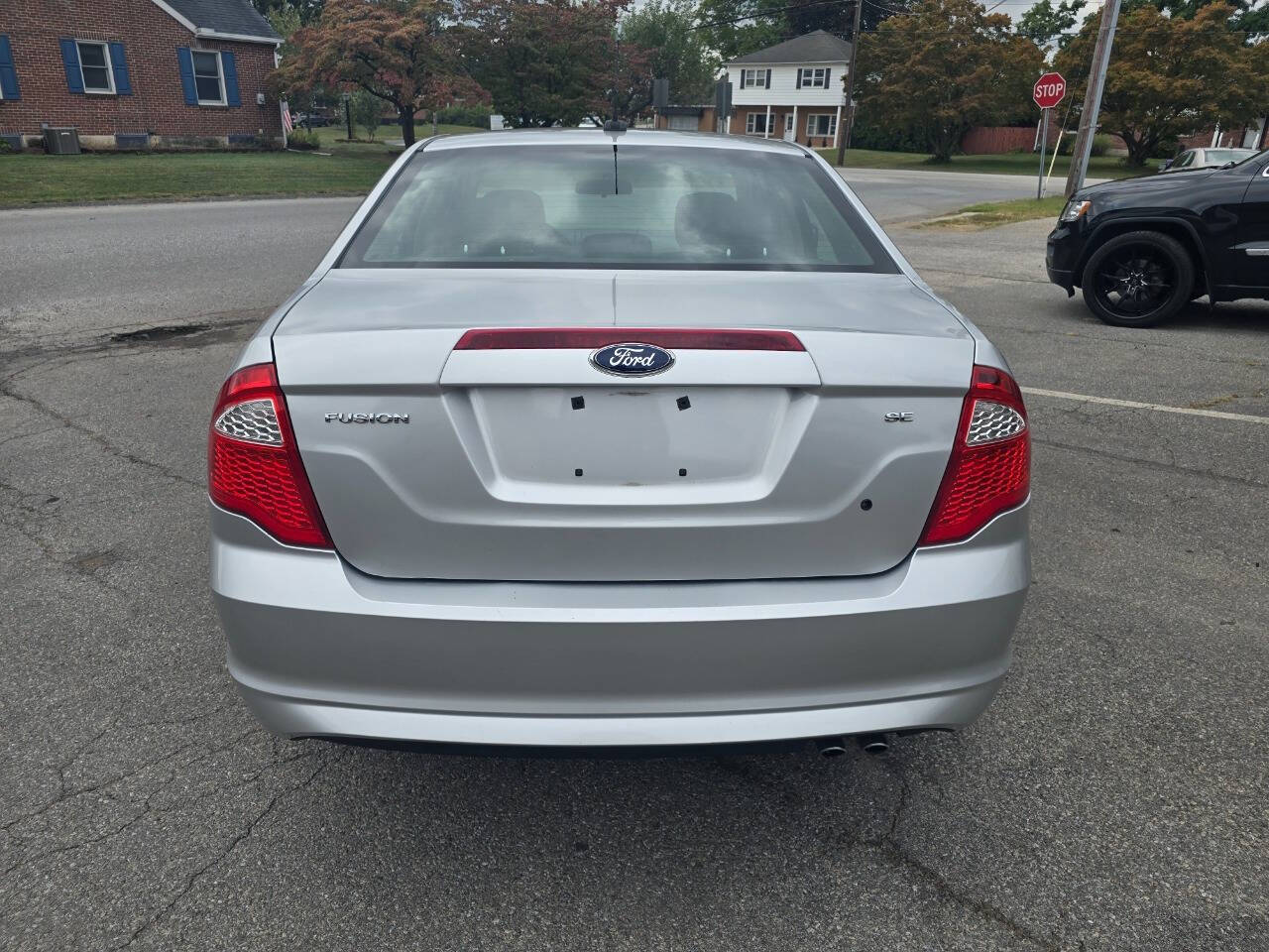 2012 Ford Fusion for sale at QUEENSGATE AUTO SALES in York, PA