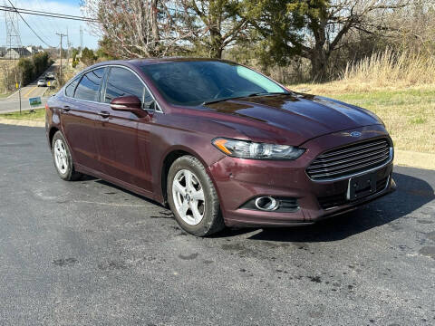 2013 Ford Fusion for sale at TRAVIS AUTOMOTIVE in Corryton TN