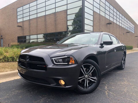 2014 Dodge Charger for sale at Dymix Used Autos, Inc. in Detroit MI