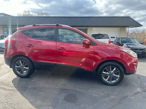 2015 Hyundai Tucson for sale at Reliable Auto LLC in Manchester NH