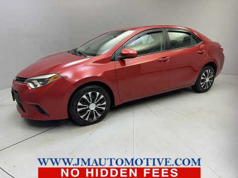 2014 Toyota Corolla for sale at J & M Automotive in Naugatuck CT