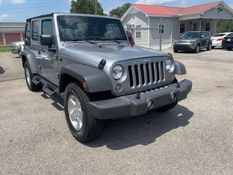 2014 Jeep Wrangler Unlimited for sale at RPM AUTO LAND in Anniston AL