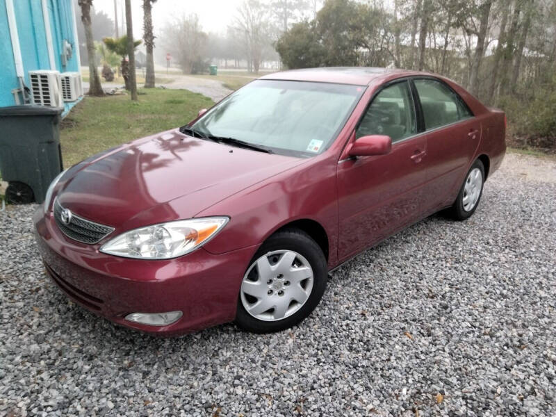 2004 Toyota Camry for sale at C and G Used Cars LLC in Slidell LA