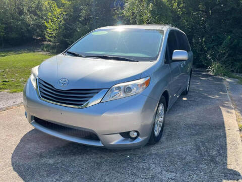 2014 Toyota Sienna for sale at A & A Auto Sales in Fayetteville AR