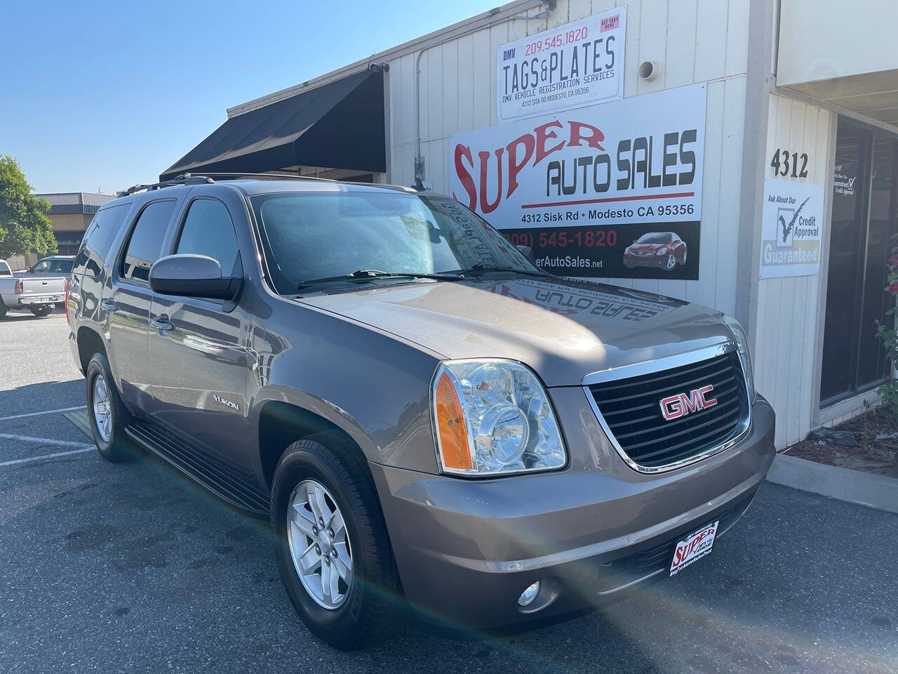 2014 GMC Yukon for sale at Super Auto Sales Modesto in Modesto, CA