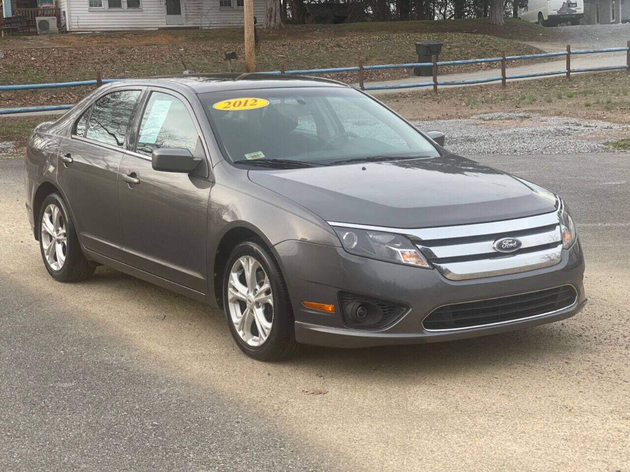 2012 Ford Fusion for sale at Hayasa Motors, LLC. in Sevierville, TN