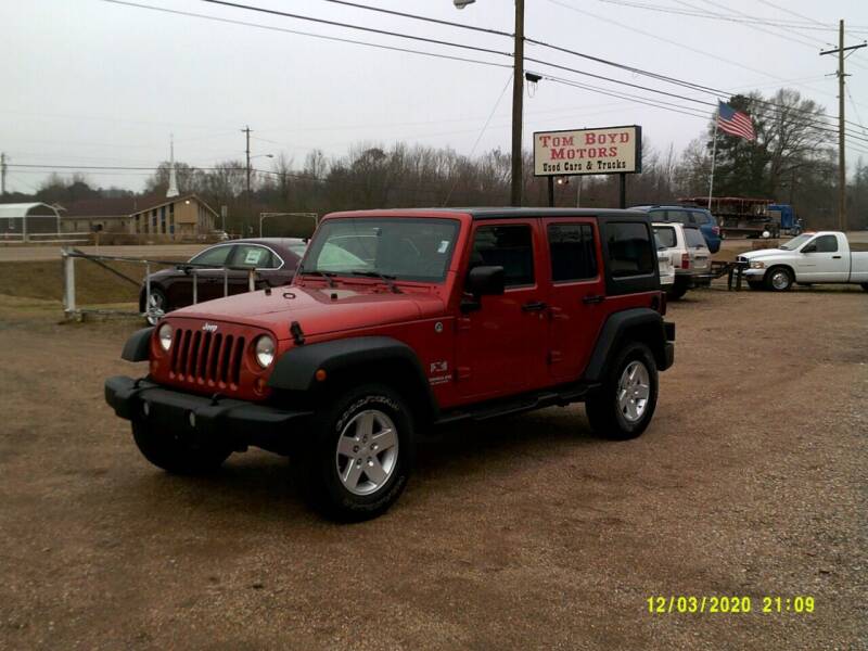 2009 Jeep Wrangler Unlimited for sale at Tom Boyd Motors in Texarkana TX