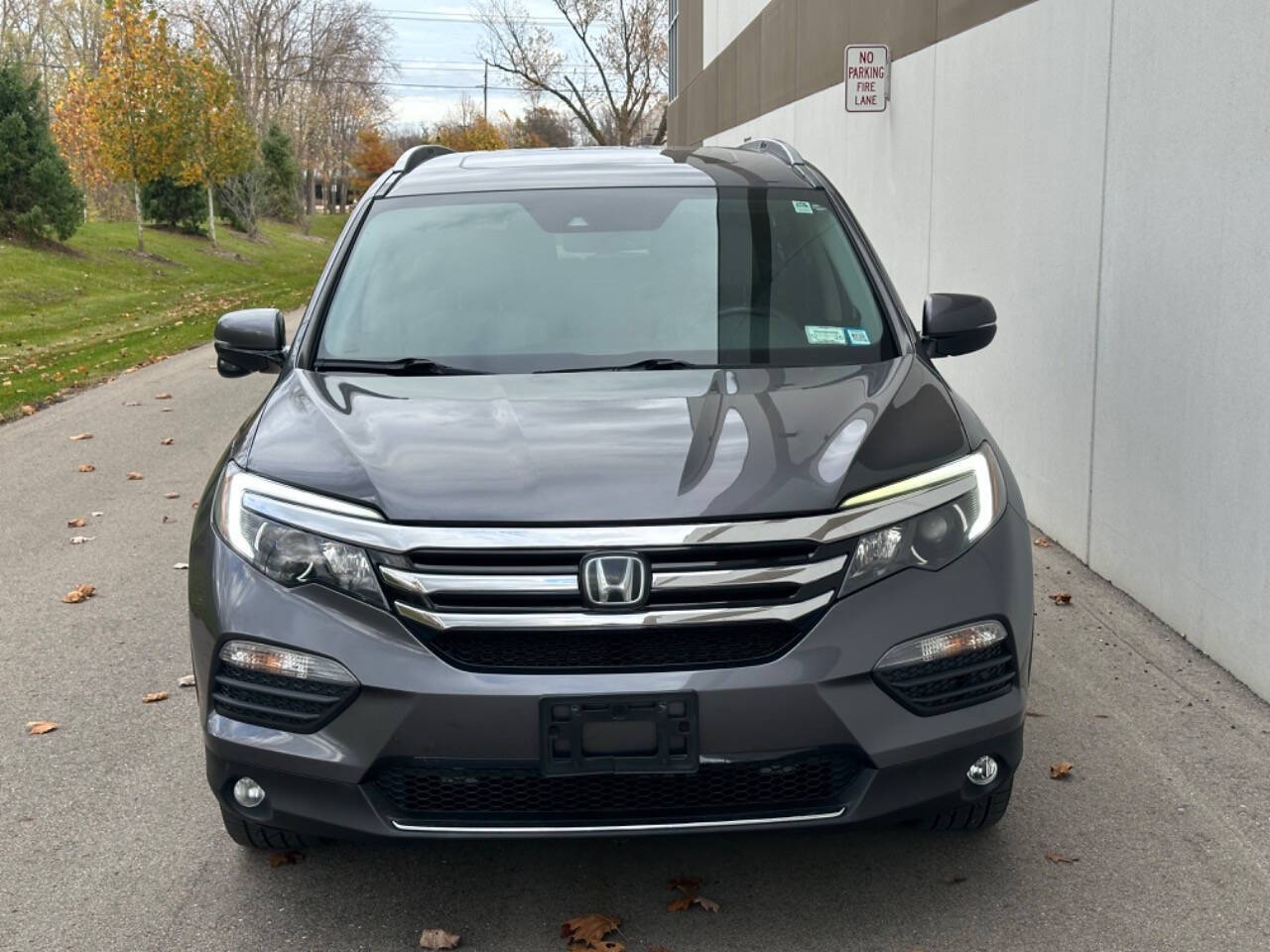 2017 Honda Pilot for sale at Phoenix Motor Co in Romulus, MI