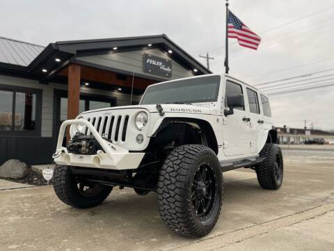 2014 Jeep Wrangler Unlimited for sale at Fesler Auto in Pendleton IN