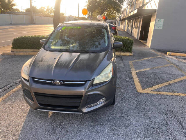 2014 Ford Escape for sale at M & J UNITED AUTO SALES in LAUDERDALE LAKES, FL