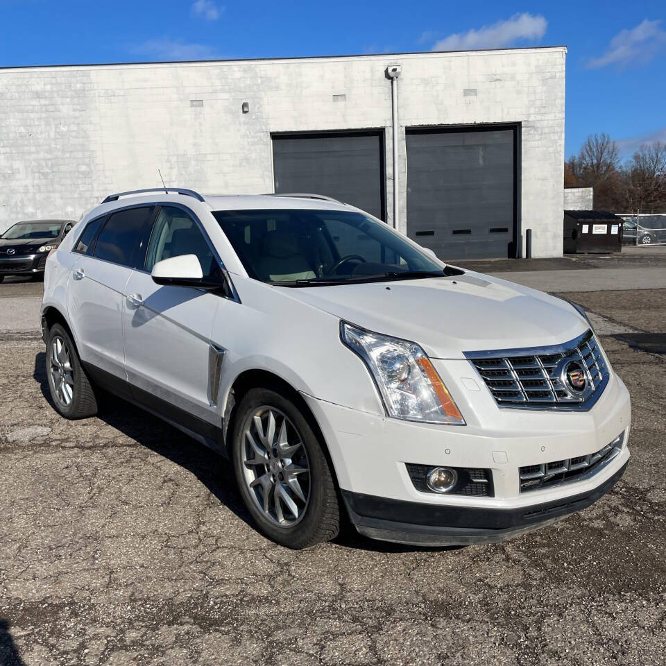 2014 Cadillac SRX for sale at Newcombs North Certified Auto Sales in Metamora, MI