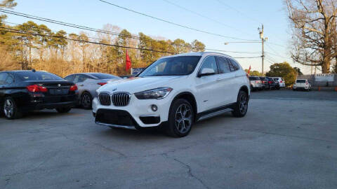 2018 BMW X1 for sale at DADA AUTO INC in Monroe NC