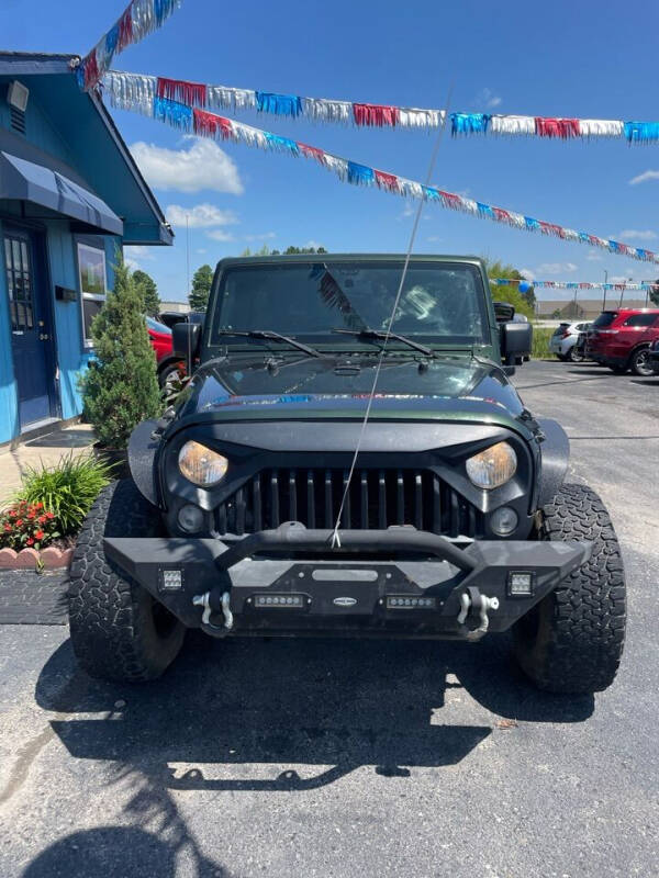 2011 Jeep Wrangler Unlimited for sale at A Z Auto Sales LLC in Siloam Springs AR