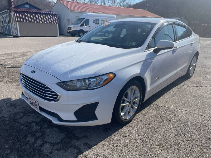 2019 Ford Fusion Hybrid for sale at PIONEER USED AUTOS & RV SALES in Lavalette WV
