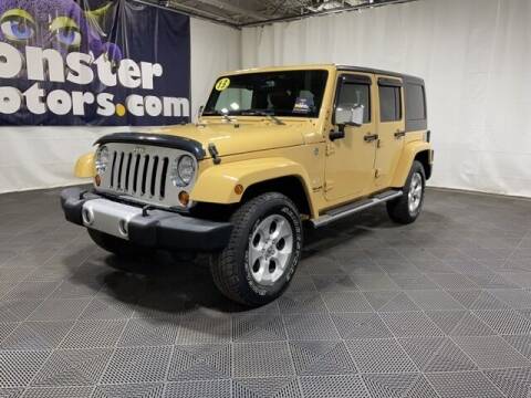 2013 Jeep Wrangler Unlimited for sale at Monster Motors in Michigan Center MI