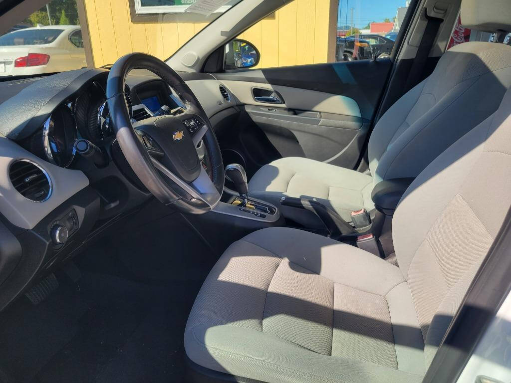 2013 Chevrolet Cruze for sale at DAGO'S AUTO SALES LLC in Dalton, GA