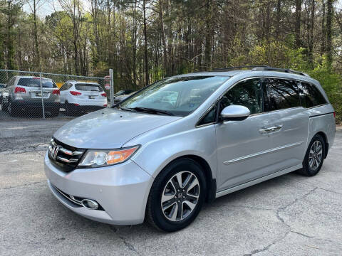 2014 Honda Odyssey for sale at Legacy Motor Sales in Norcross GA