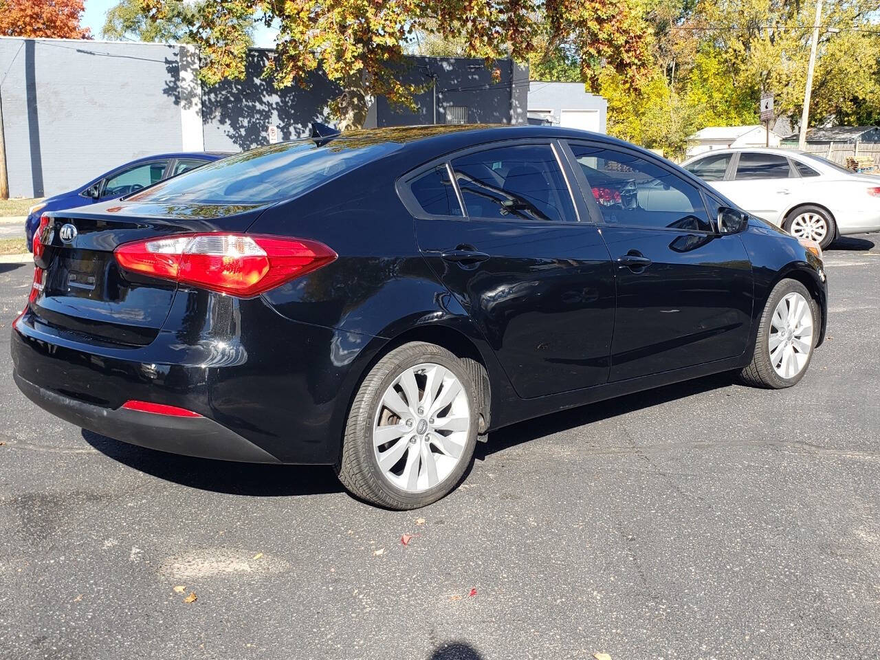 2016 Kia Forte for sale at Auto Shop in Wyoming, MI