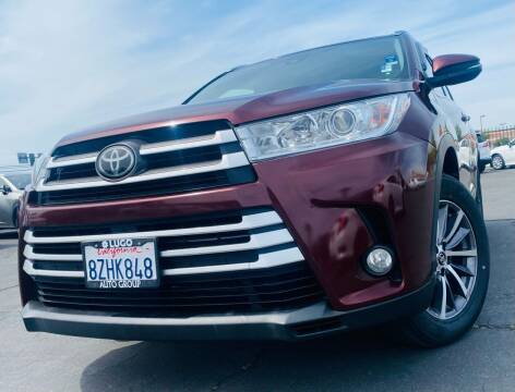 2019 Toyota Highlander for sale at Lugo Auto Group in Sacramento CA