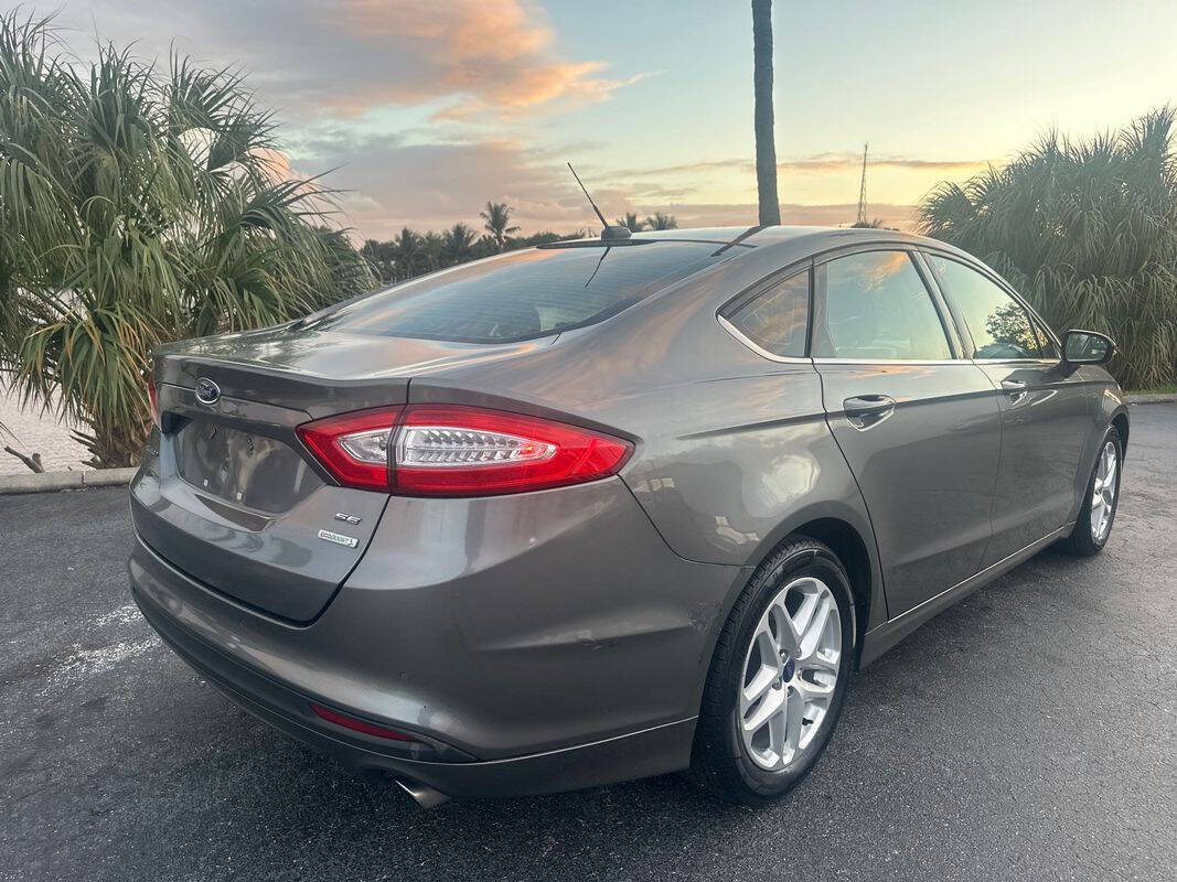 2014 Ford Fusion for sale at Tropical Auto Sales in North Palm Beach, FL