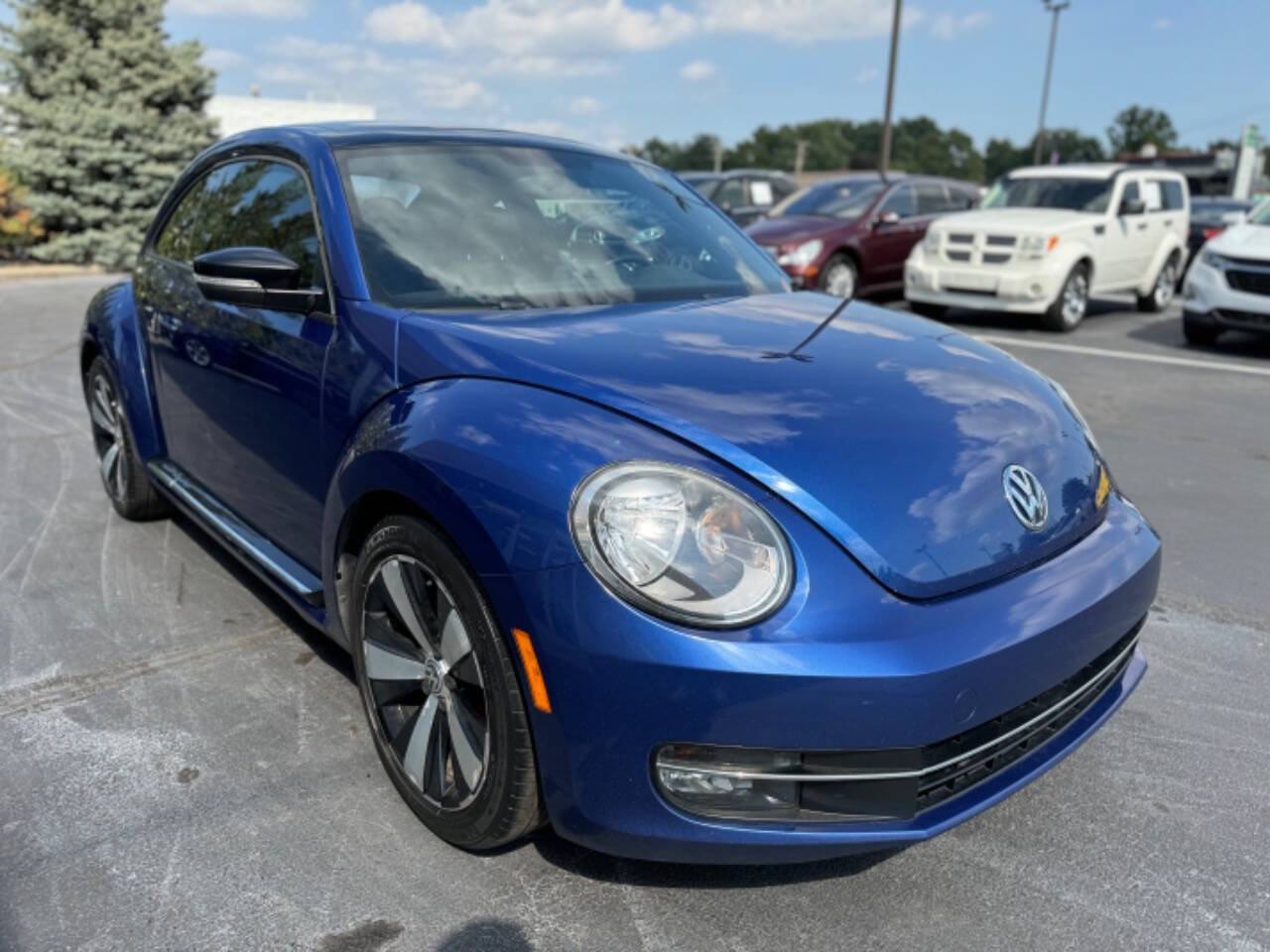 2013 Volkswagen Beetle for sale at Opus Motorcars in Utica, MI