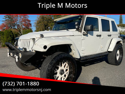 2014 Jeep Wrangler Unlimited for sale at Triple M Motors in Point Pleasant NJ