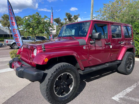 2012 Jeep Wrangler Unlimited for sale at Bay City Autosales in Tampa FL