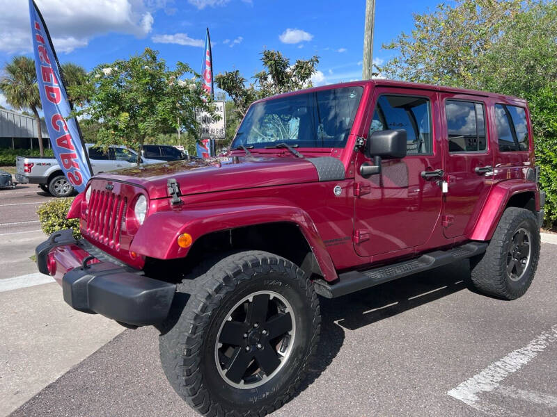 2012 Jeep Wrangler Unlimited for sale at Bay City Autosales in Tampa FL