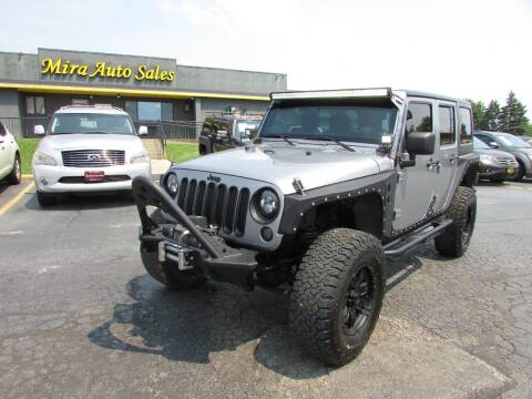 2013 Jeep Wrangler Unlimited for sale at MIRA AUTO SALES in Cincinnati OH
