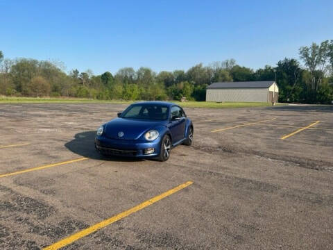2012 Volkswagen Beetle for sale at Caruzin Motors in Flint MI