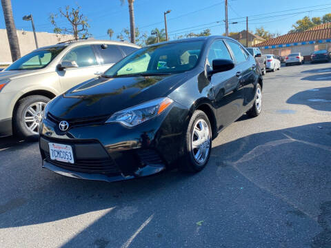 2014 Toyota Corolla for sale at MIKE AHWAZI in Santa Ana CA