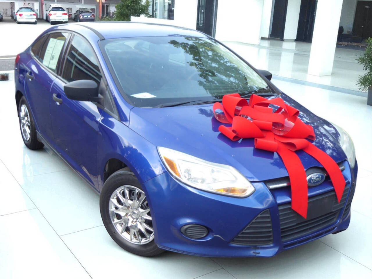 Blue 2012 Ford Focus S S 4dr Sedan 2