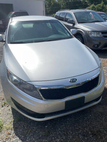 2011 Kia Optima for sale at MOORE'S AUTOS LLC in Florence SC