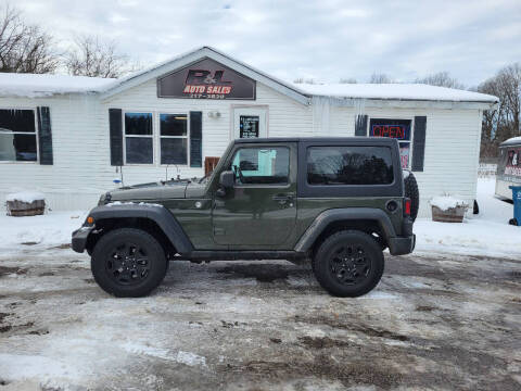 2015 Jeep Wrangler for sale at R & L AUTO SALES in Mattawan MI