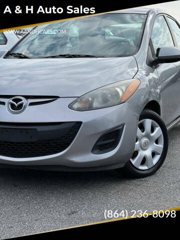 2012 Mazda MAZDA2 for sale at A & H Auto Sales in Greenville SC