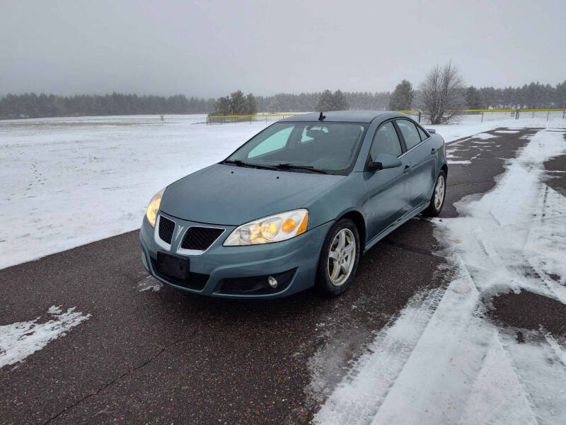 2009 Pontiac G6 for sale at NOKOMIS AUTO SALES AND SERVICE LLC in Tomahawk WI