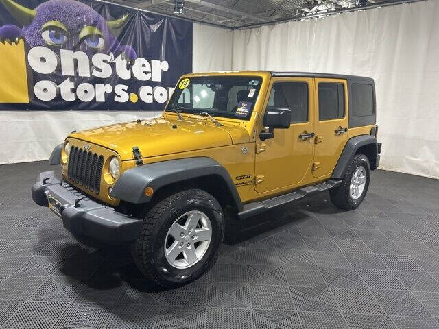 2014 Jeep Wrangler Unlimited for sale at Monster Motors in Michigan Center MI