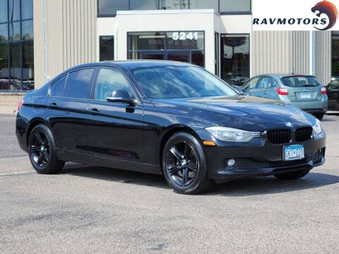 2015 BMW 3 Series for sale at RAVMOTORS - CRYSTAL in Crystal MN