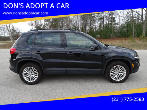 2016 Volkswagen Tiguan for sale at DON'S ADOPT A CAR in Cadillac MI