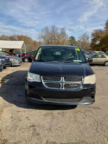 2014 Dodge Grand Caravan for sale at Autocom, LLC in Clayton NC