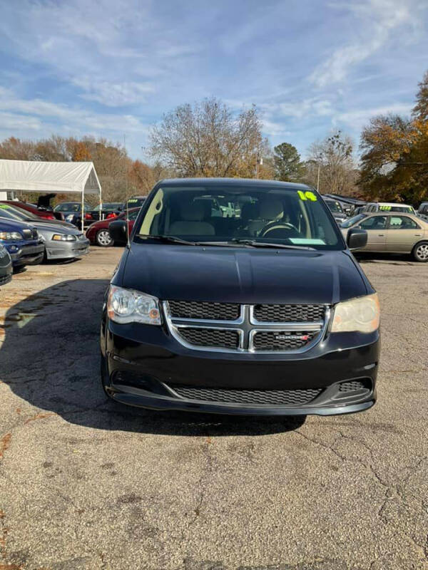 2014 Dodge Grand Caravan for sale at Autocom, LLC in Clayton NC